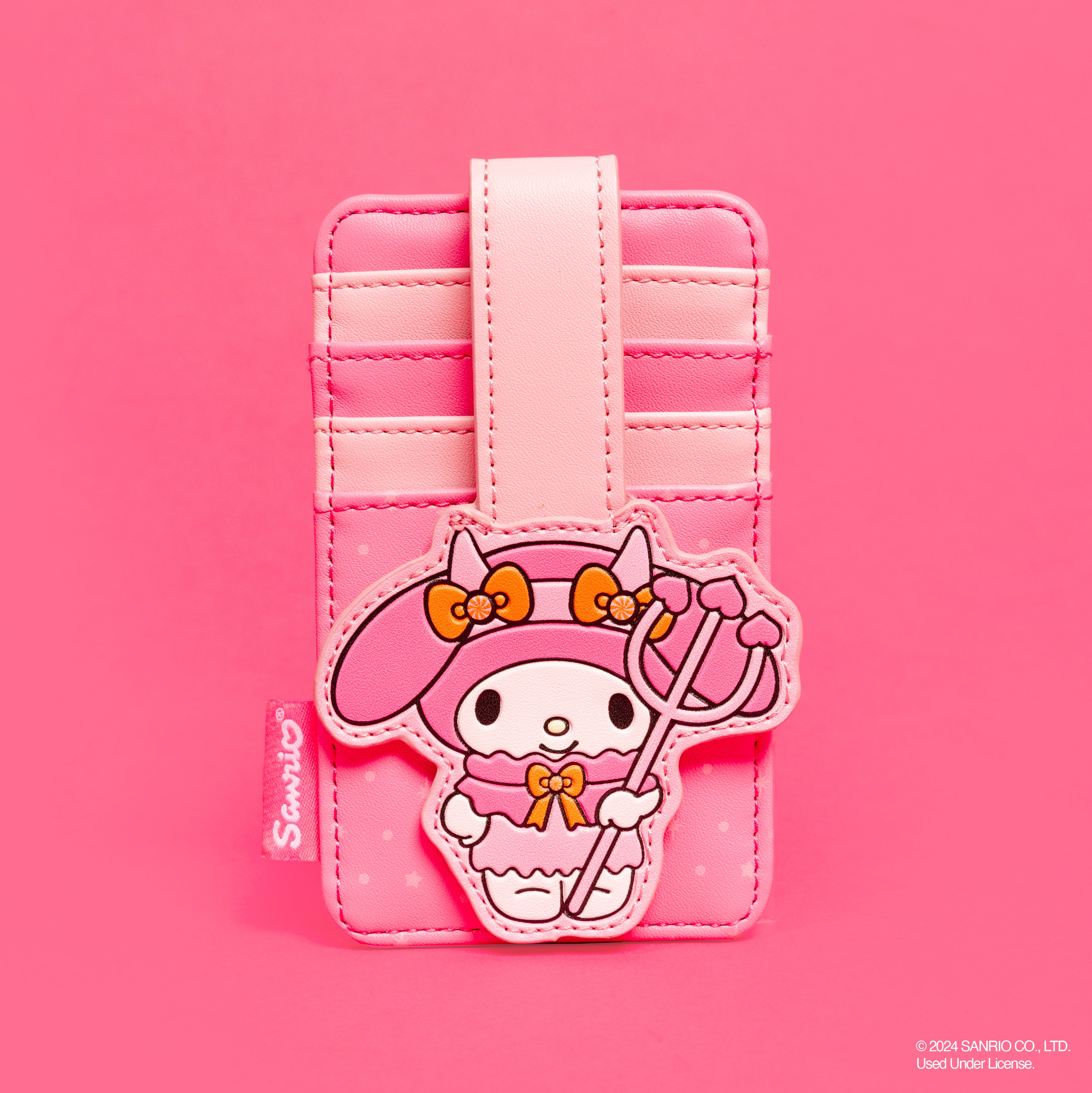 My Melody x Loungefly Pumpkin Card Holder front view, showcasing the appliqué snap of My Melody as a devil.