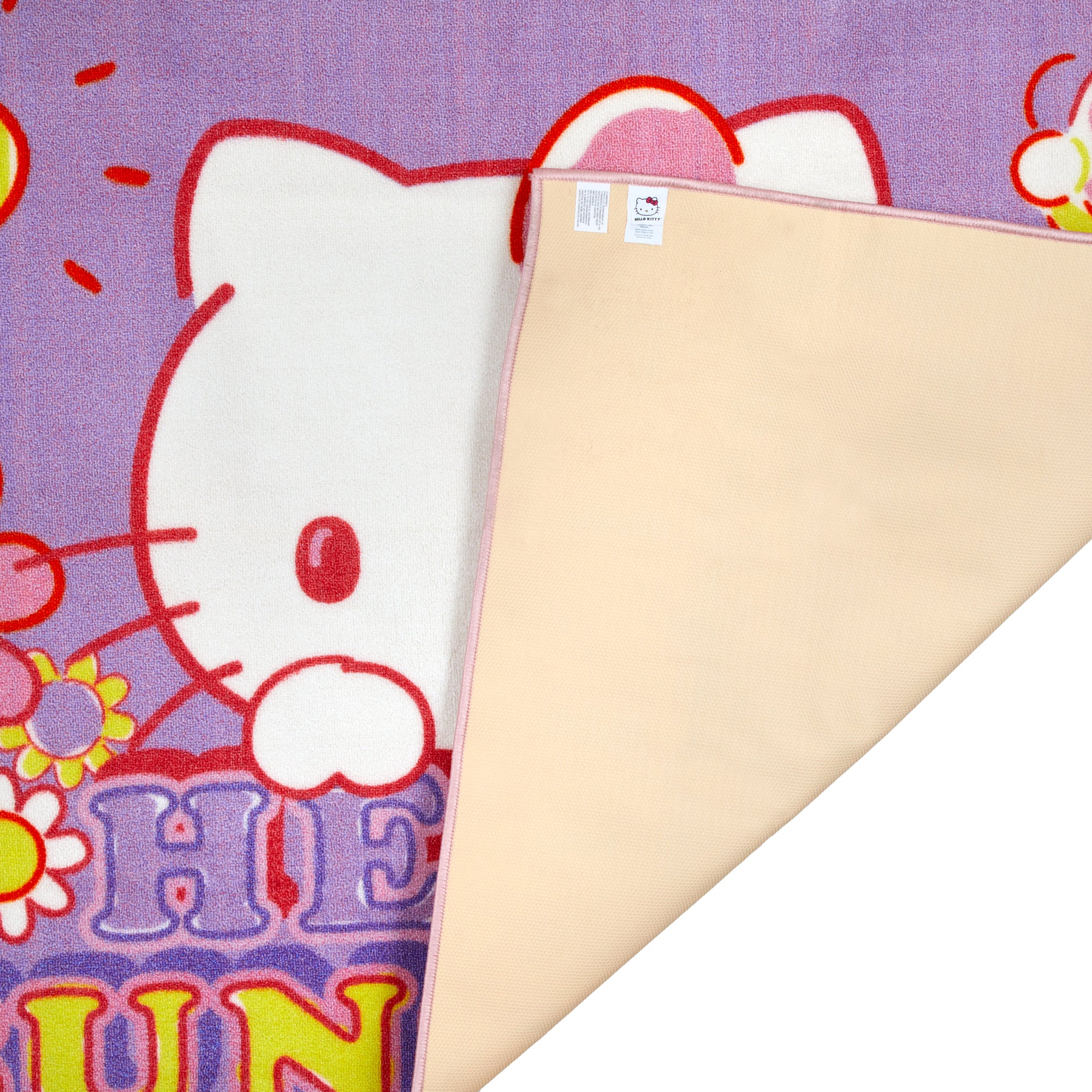 Close-up of the Hello Kitty rugs vibrant design and soft texture.