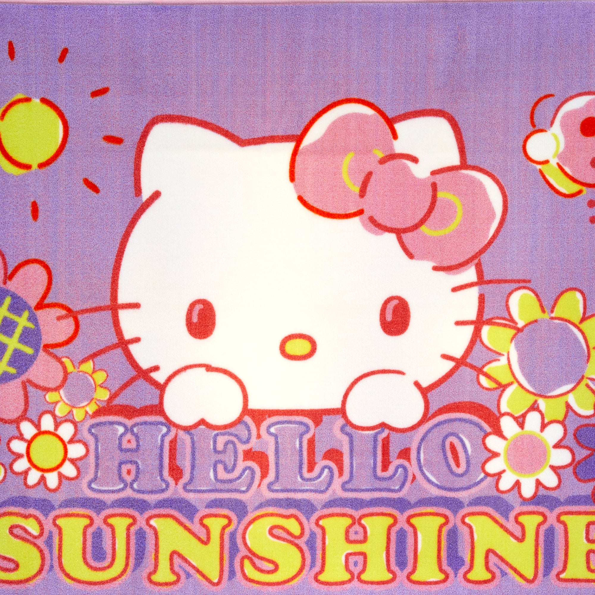 Hello Kitty rug in a cozy kids bedroom, enhancing the decor.