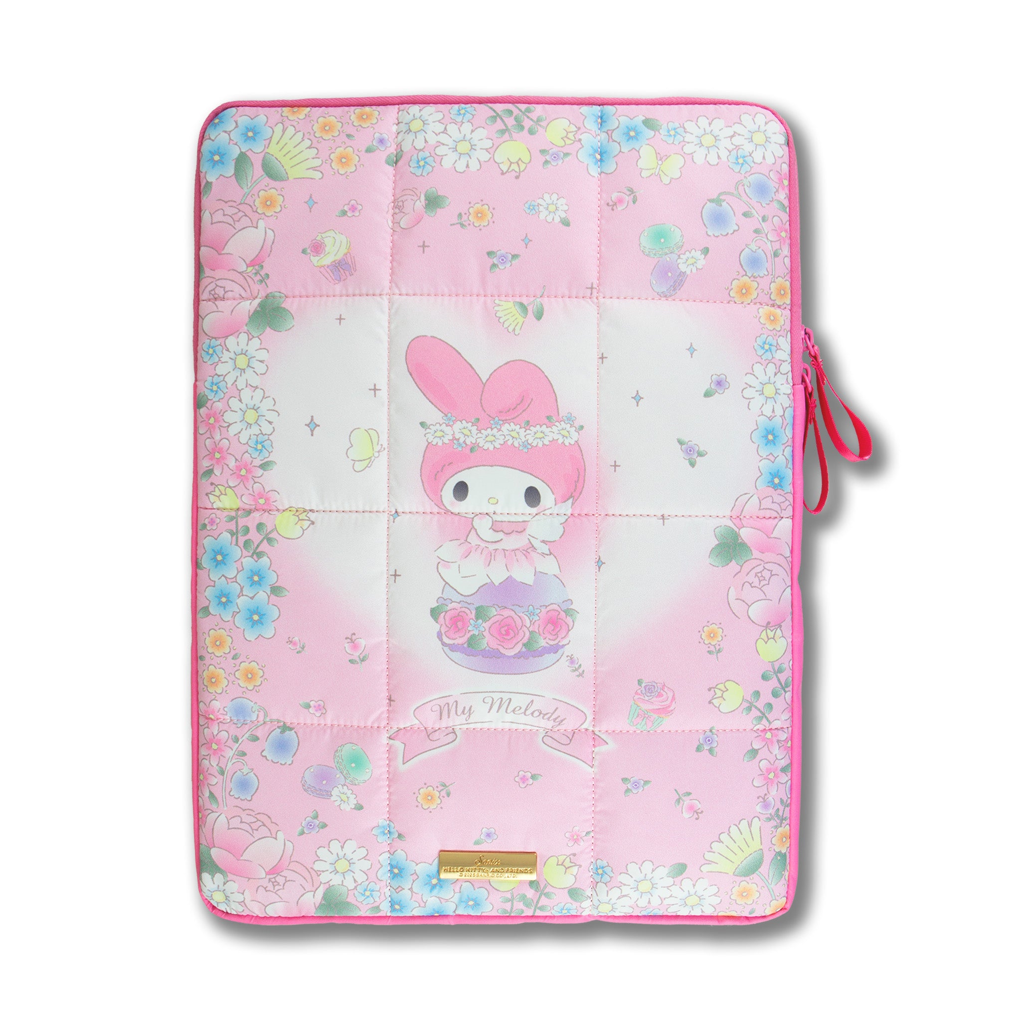 Limited-edition My Melody merchandise displayed with laptop accessories