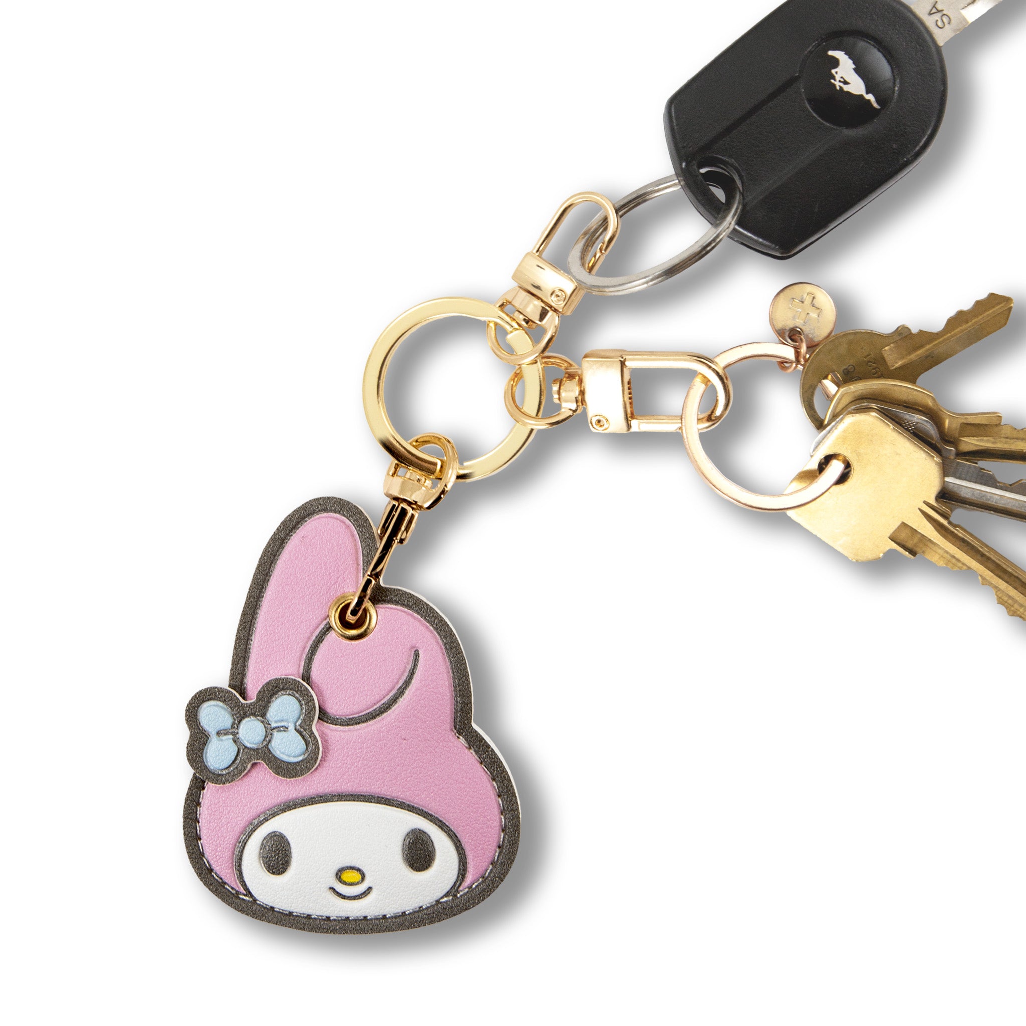 My Melody keychain attached to a backpack zipper for urban travel