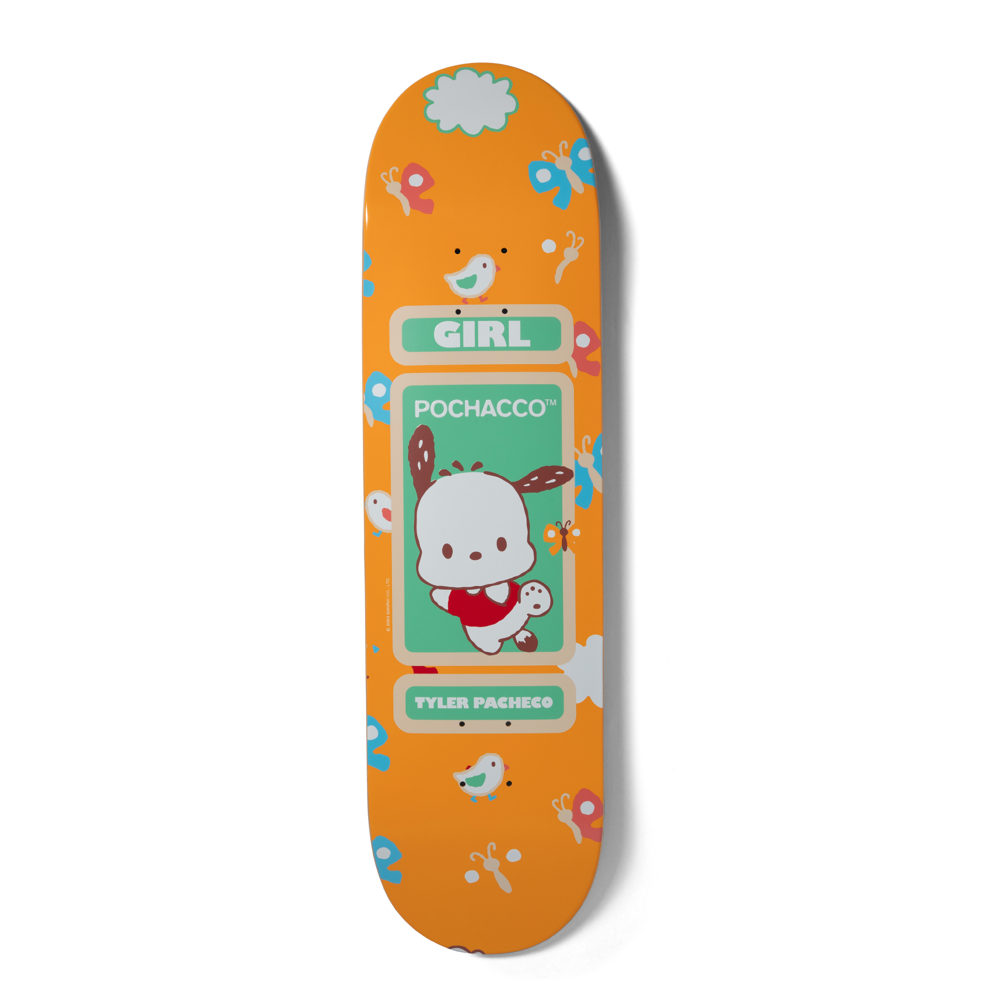 Close-up of Pochacco graphic on skateboard deck, showcasing vibrant colors.