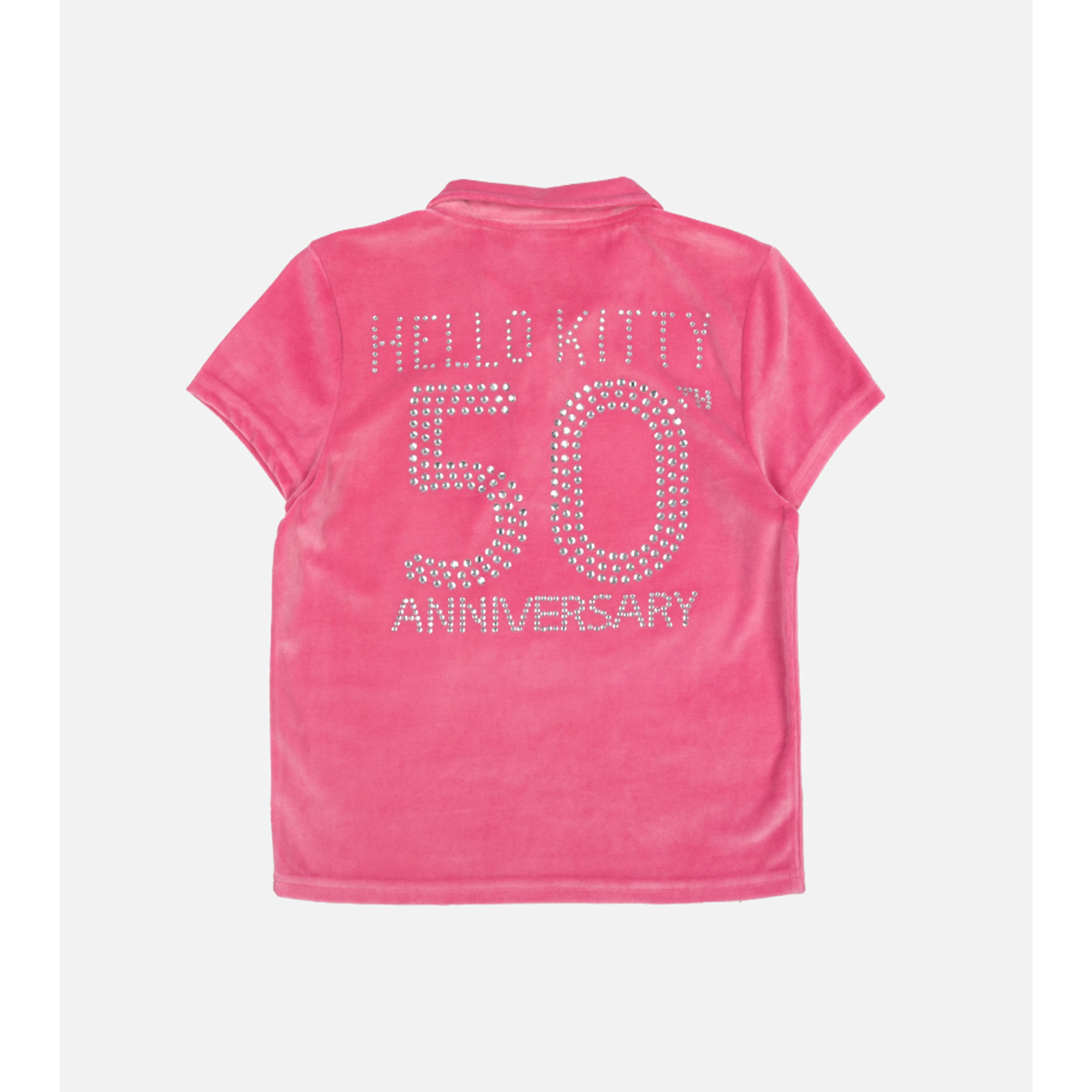 Model styled in the Hello Kitty hoodie and cropped polo outfit for casual wear.