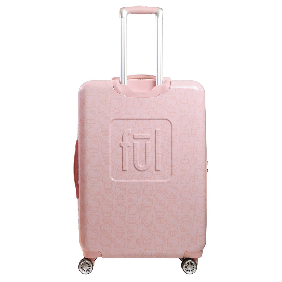 Front view of pink Hello Kitty hard shell suitcase standing upright near a hotel lobby.