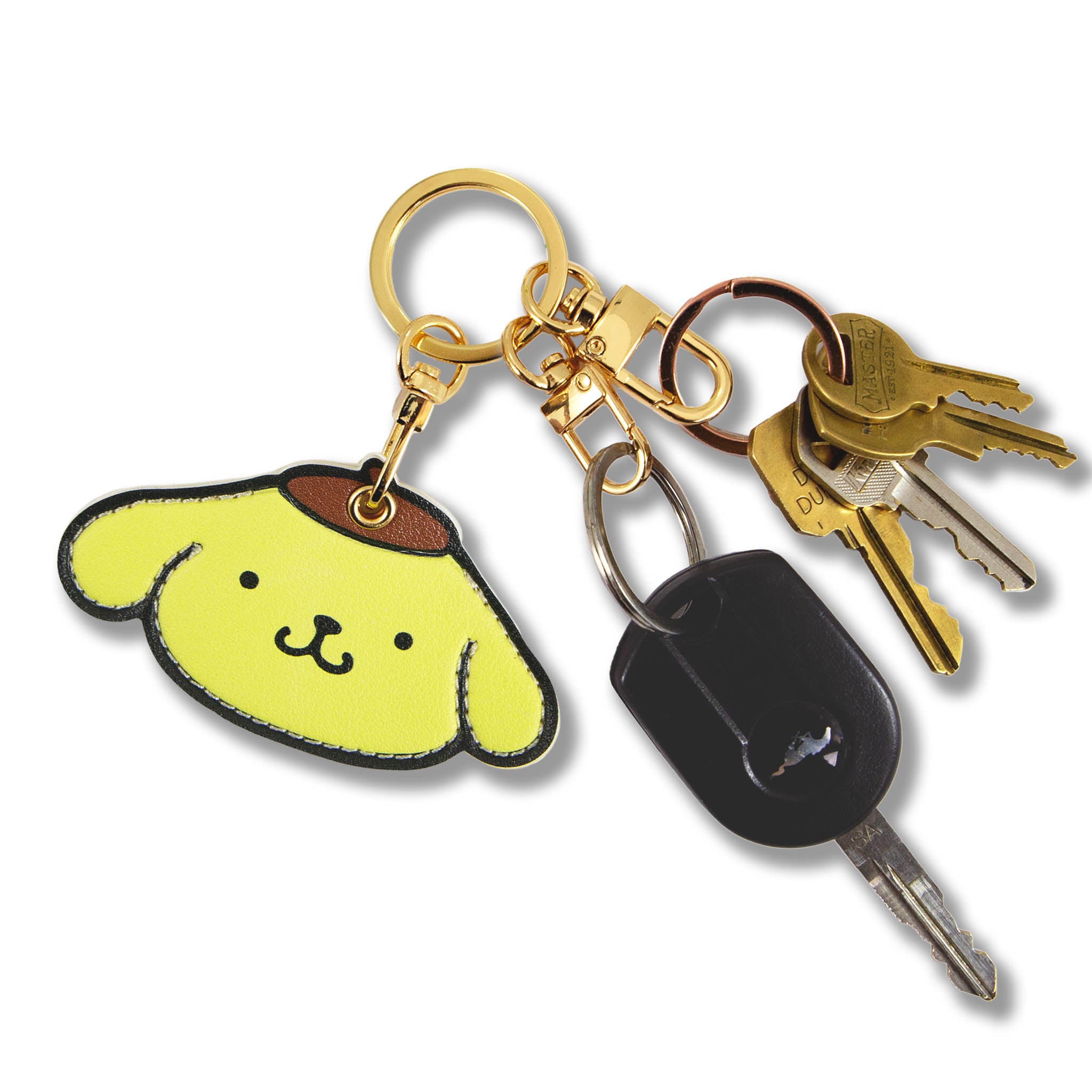 Close-up of the Pompompurin character charm on the leather airtag holder