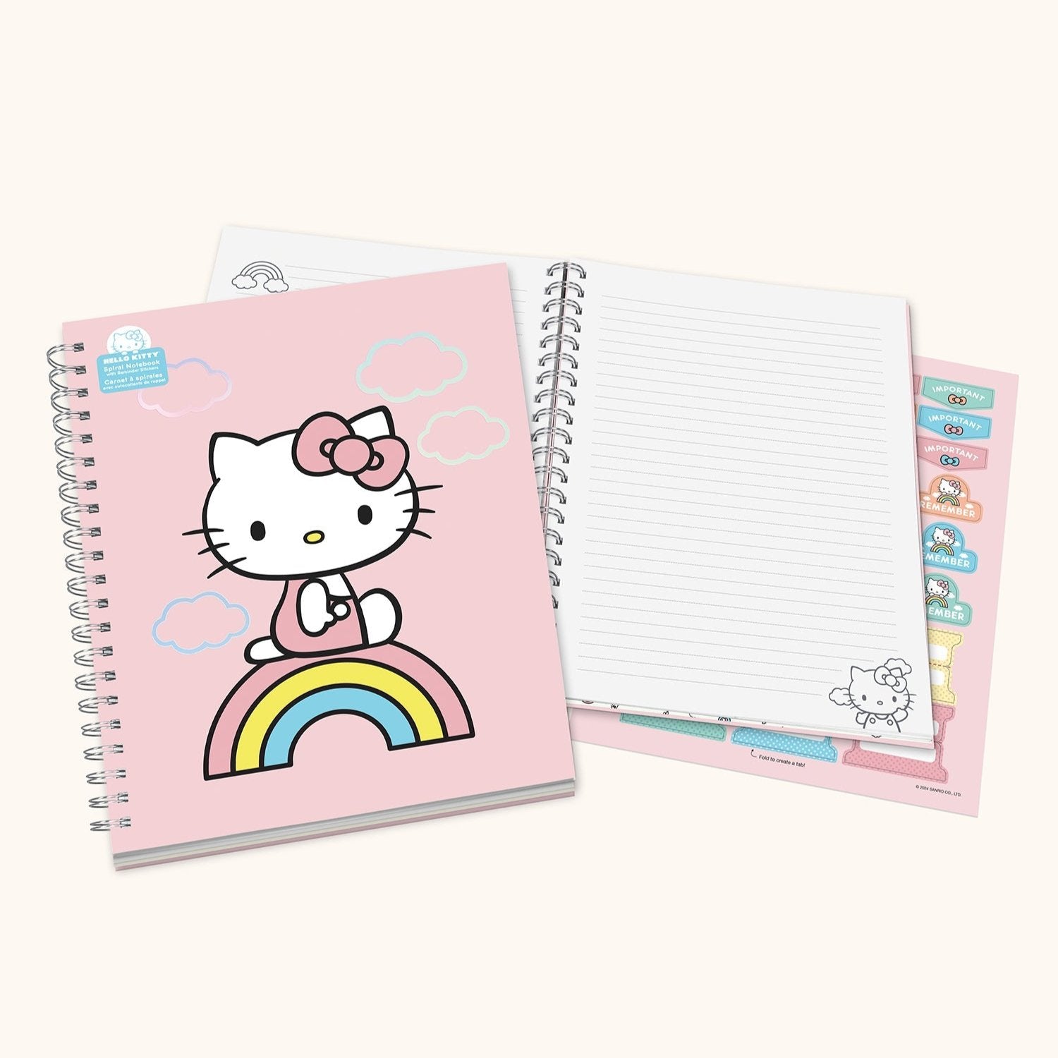 Close-up of spiral bound notebook open with reminder stickers and writing in progress