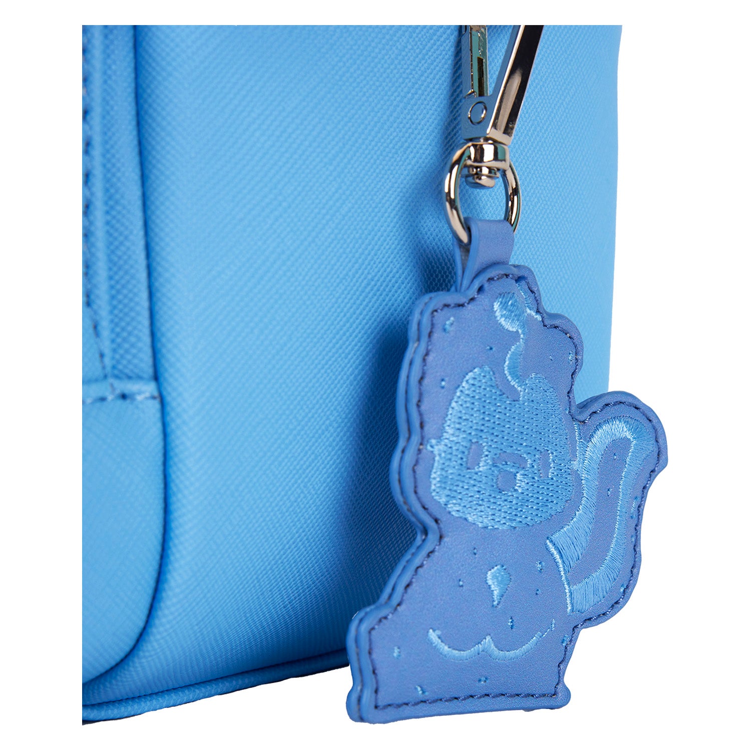Front view of the Pochacco Disney backpack showing its convertible straps and charm details