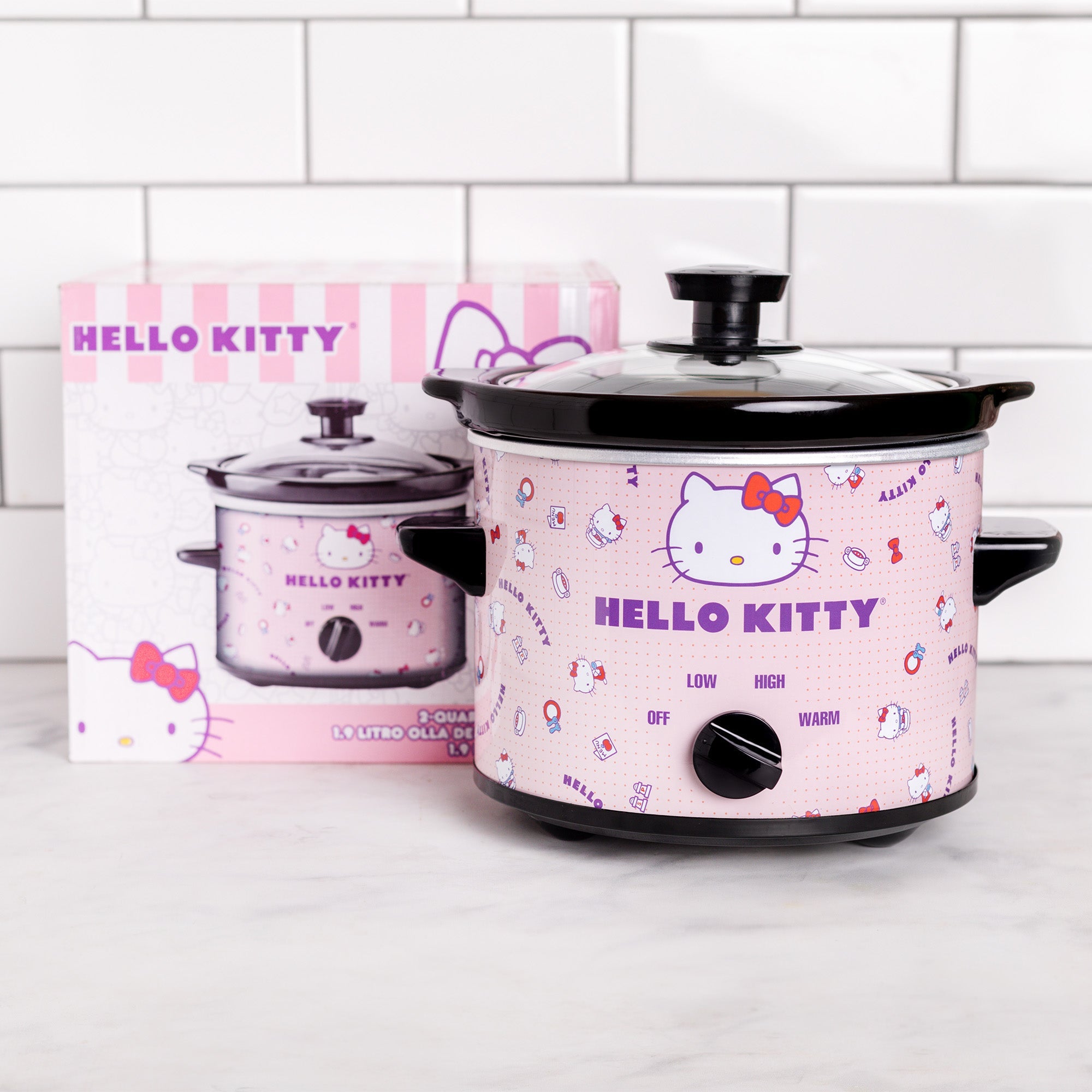 Hello Kitty 2-quart slow cooker with lid off, showing stoneware insert