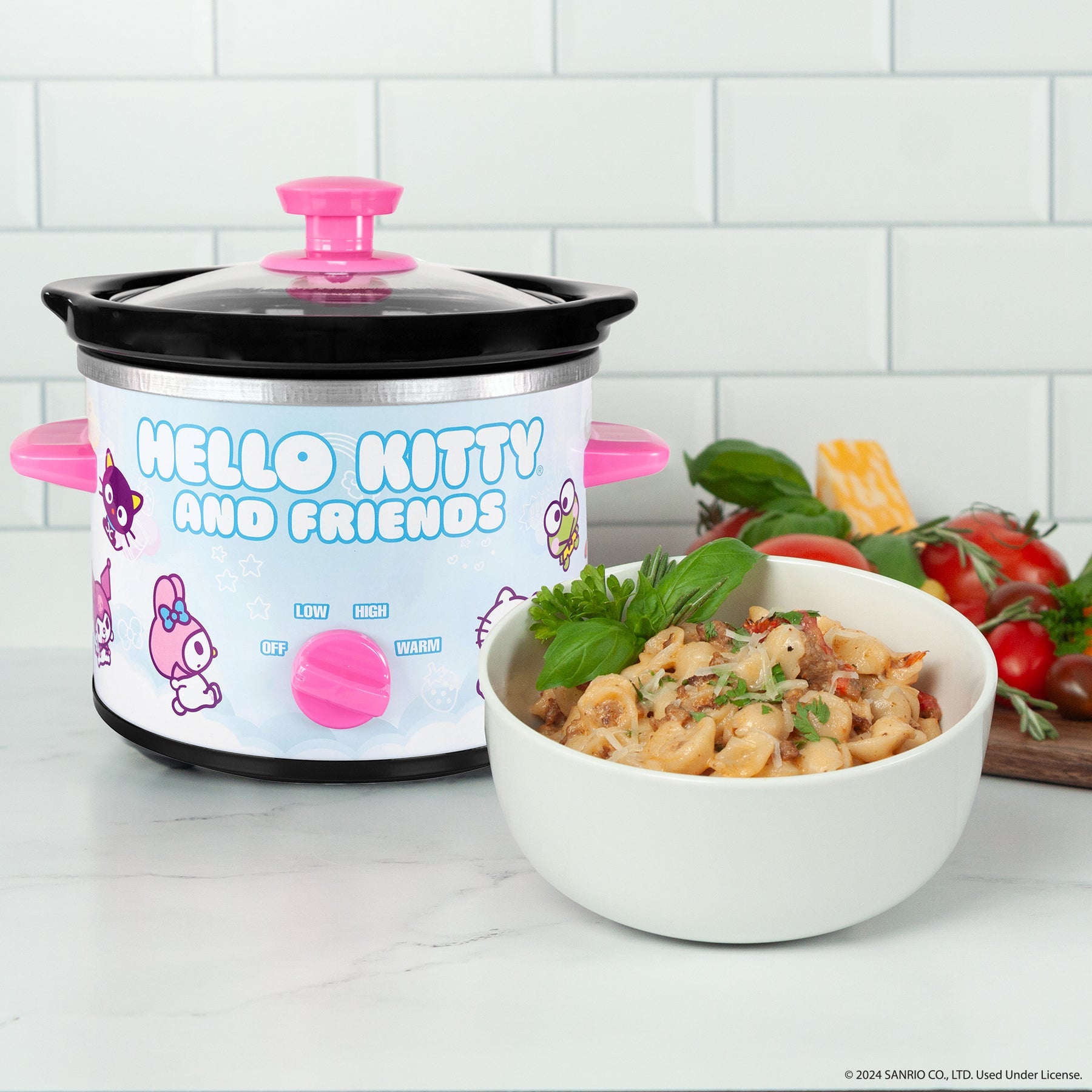 Close-up of Hello Kitty themed 2-quart crockpot on kitchen counter