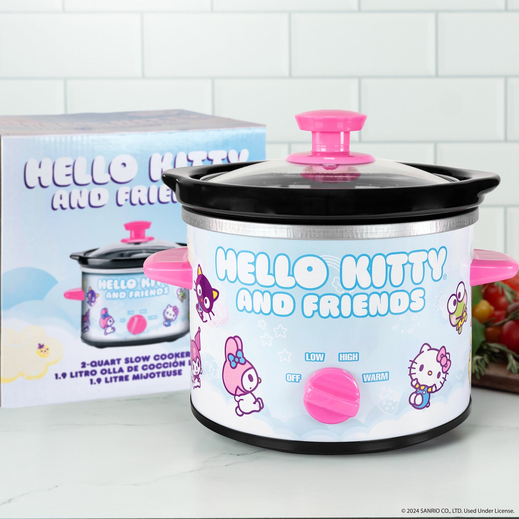 Close-up of Hello Kitty themed 2-quart crockpot on kitchen counter