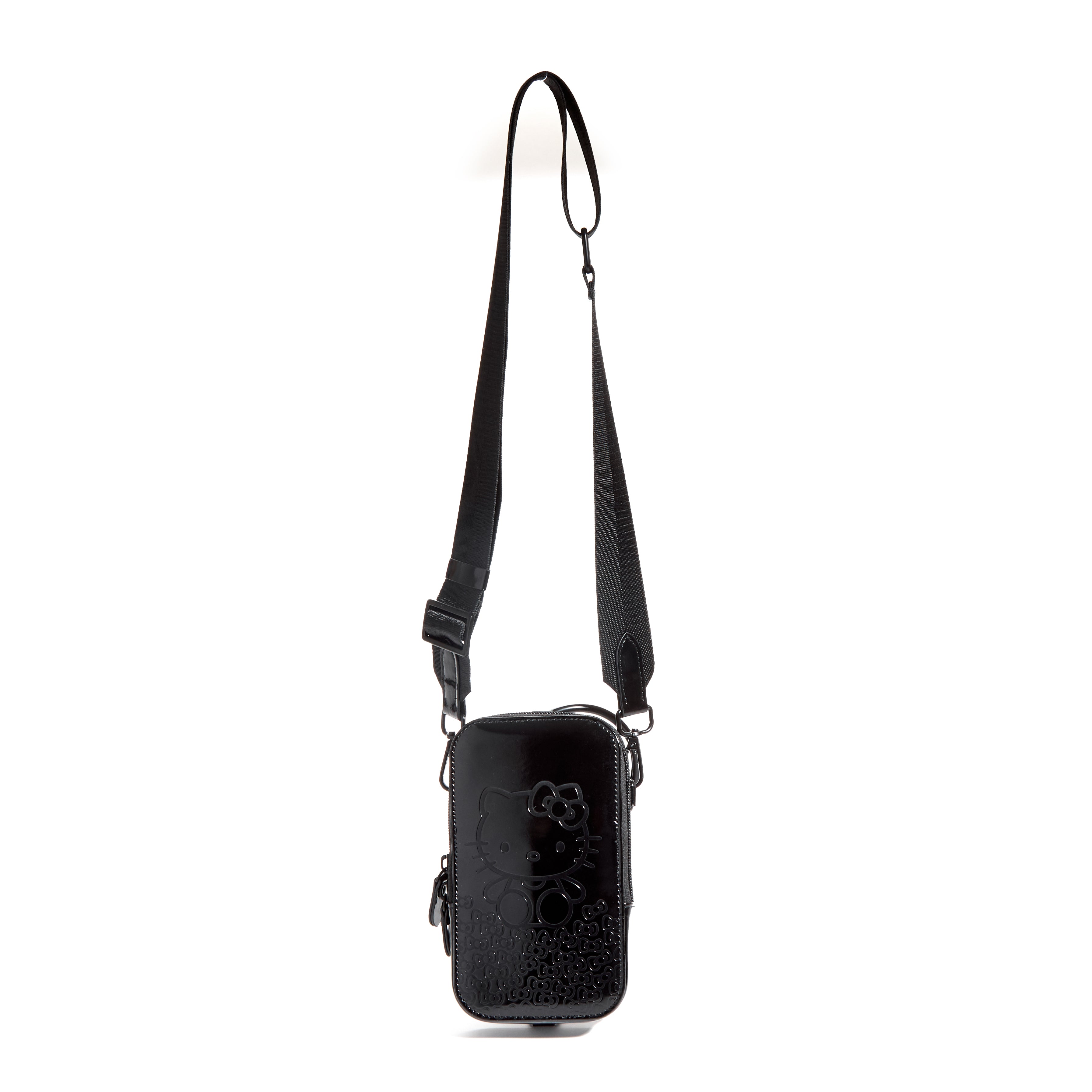 Versatile 3-in-1 Hello Kitty phone pouch worn as a crossbody or wristlet during outdoor outing