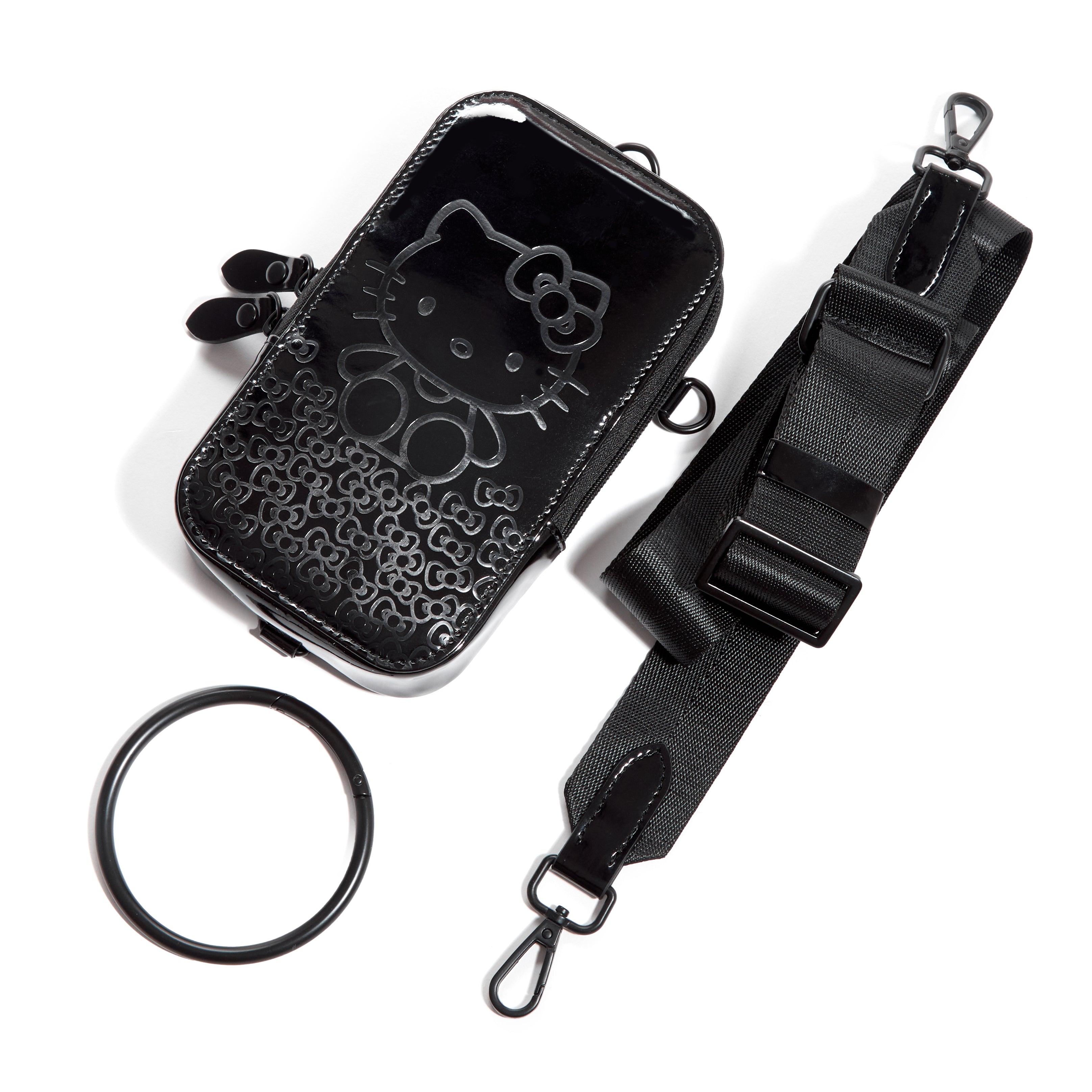 Inside view of the black vegan patent leather phone case with card slots and mesh pockets