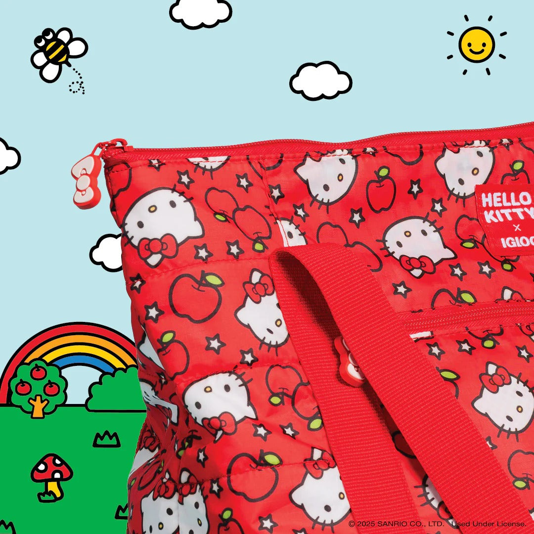 Hello Kitty cooler bag with red apples design on outdoor picnic