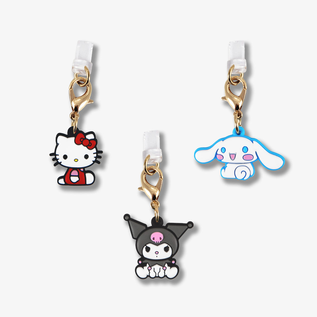 Hello Kitty charging port charm with USB-C connector for devices.