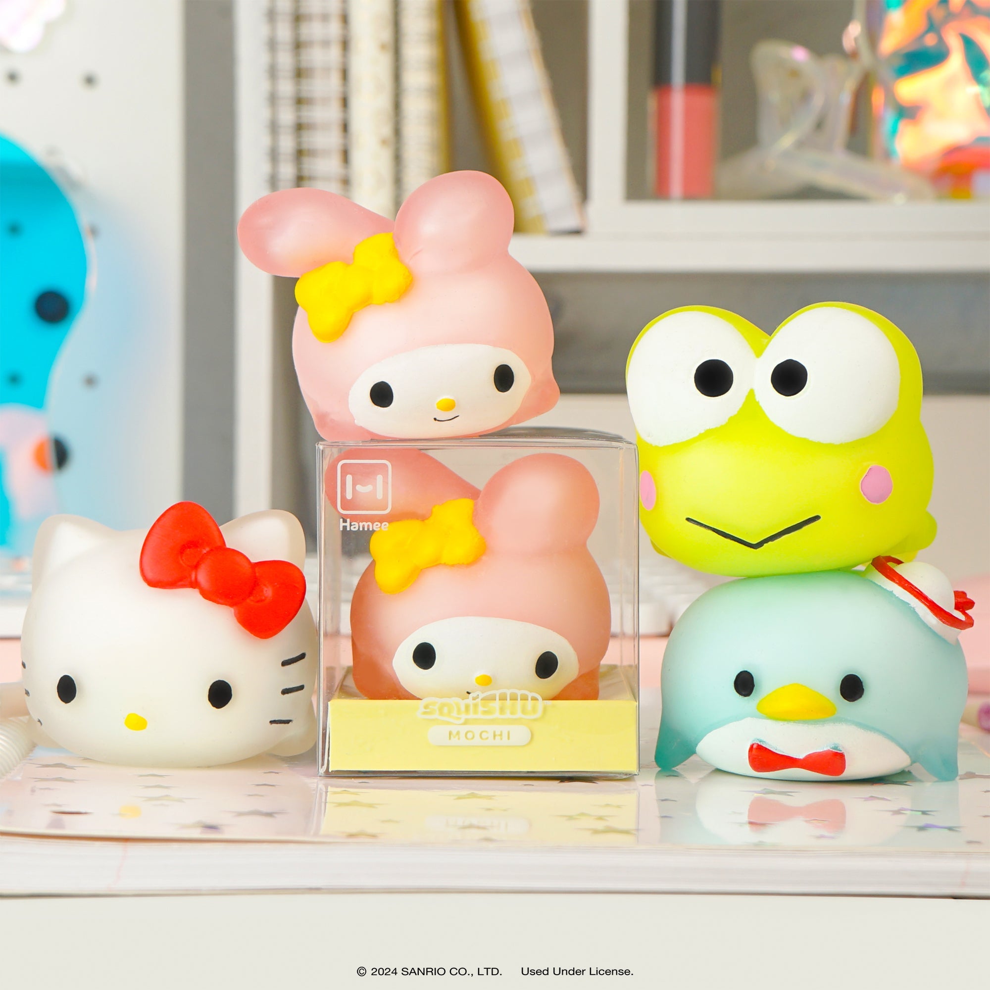 Tuxedosam and Keroppi Squishy Toys on display
