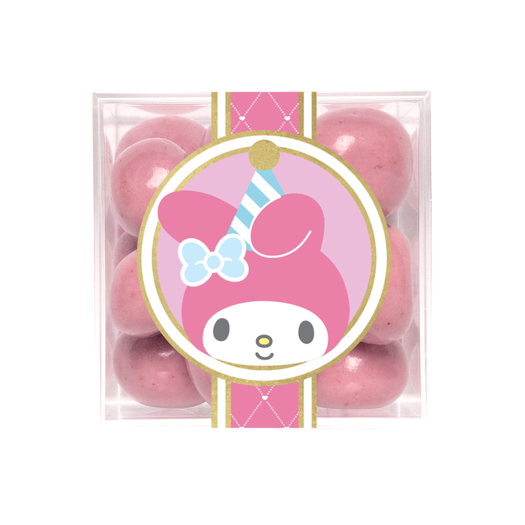 Decorative gift cube with white chocolate raspberry cookies and character artwork, ideal for special celebrations
