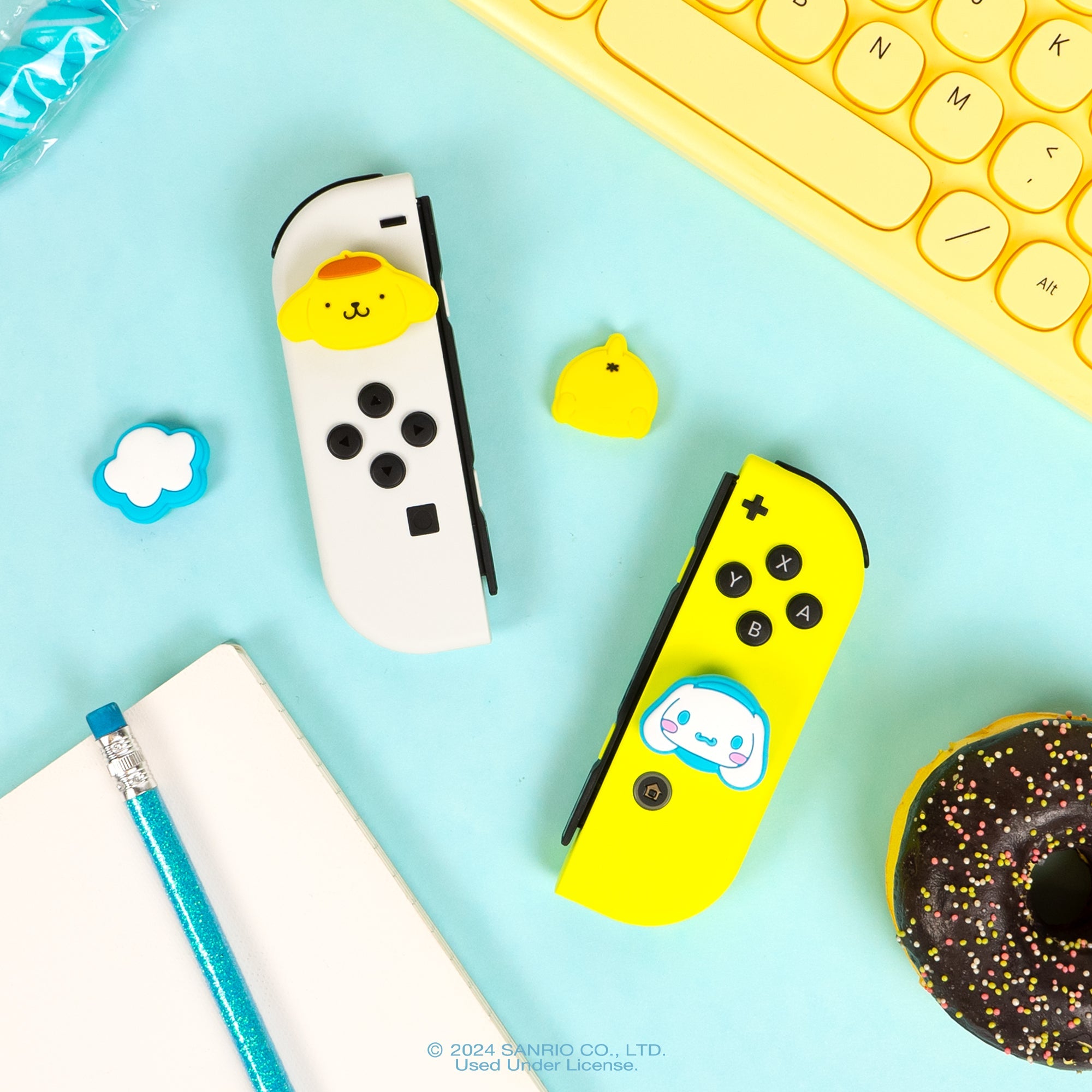 Pompompurin character grip caps displayed on a Nintendo Switch.