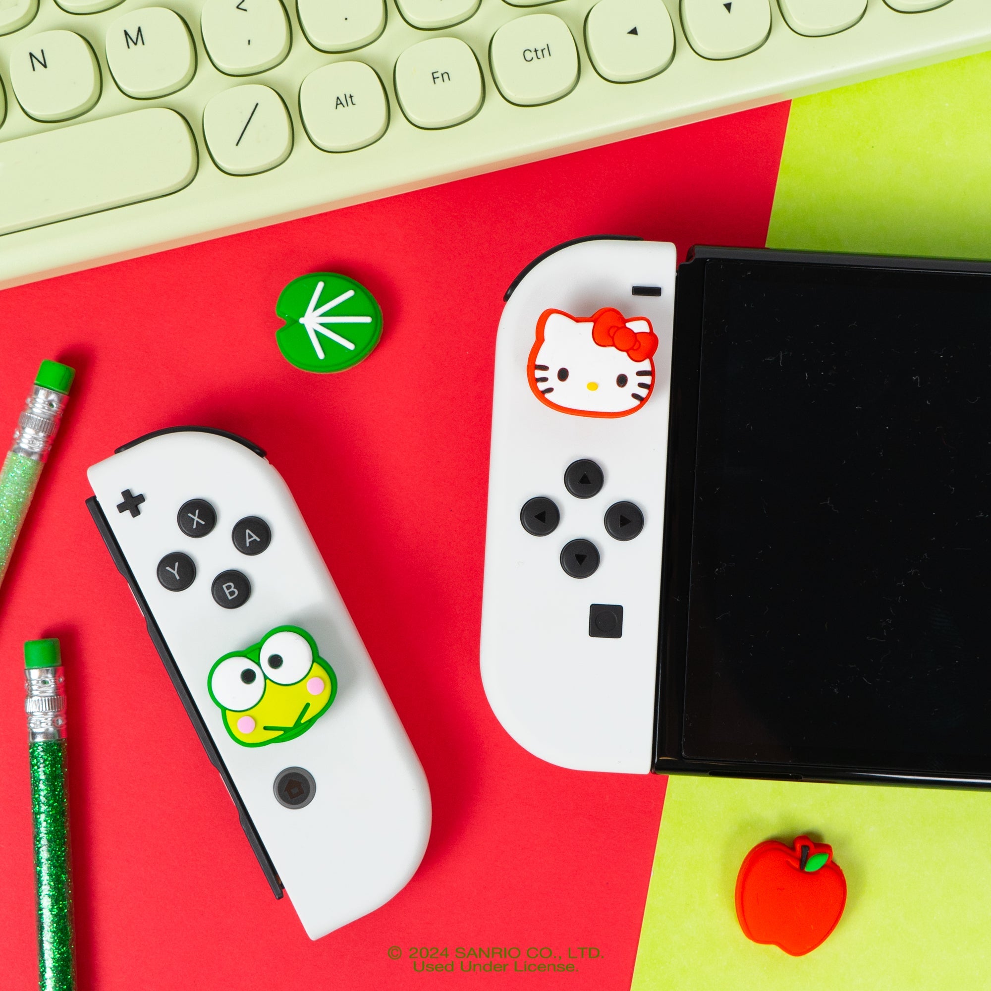 Close-up of silicone character grip caps for Nintendo Switch Lite controllers