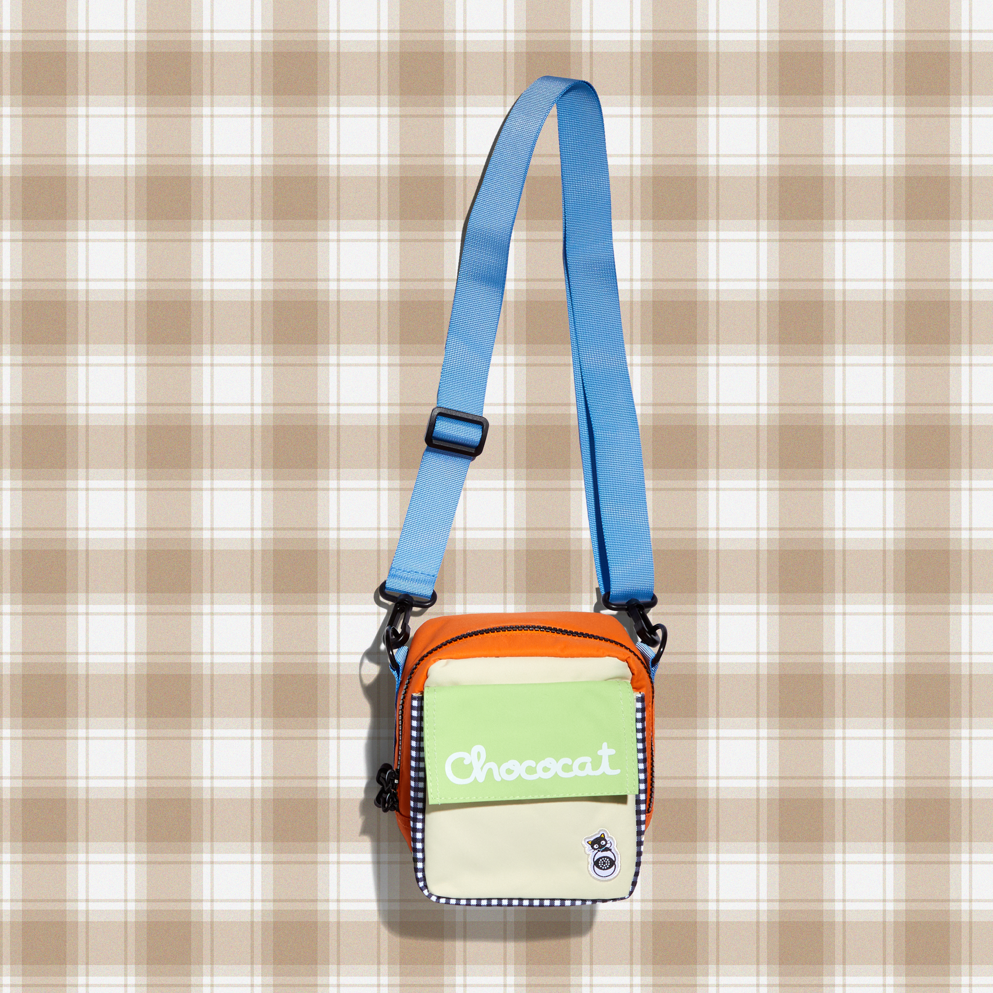 Chococat camera bag with adjustable strap and front pocket for film