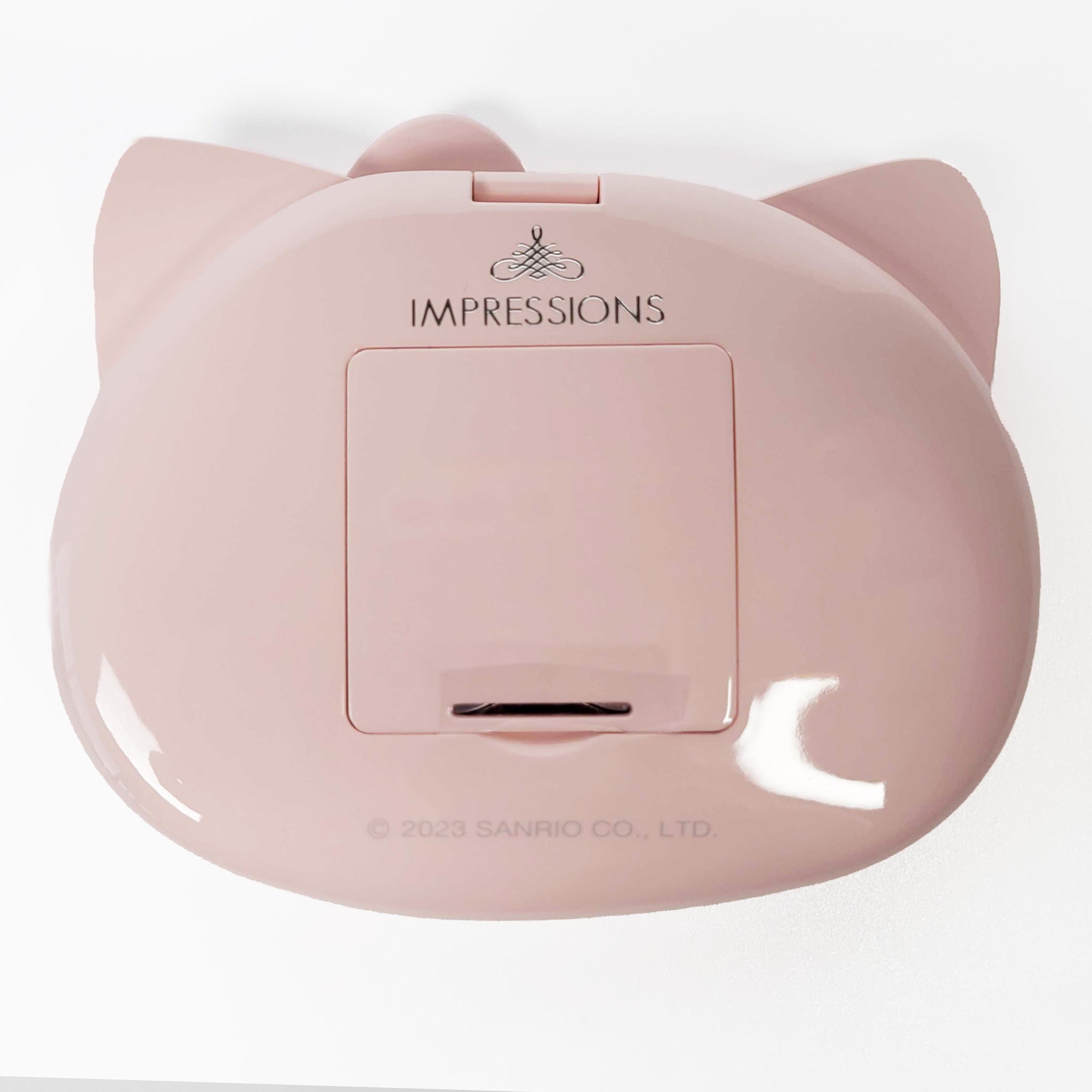 Open Hello Kitty LED light compact mirror with dual magnified and standard mirrors