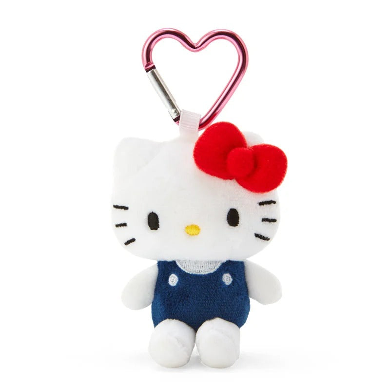 Hello Kitty plush keychain with heart-shaped clip attached to a bag