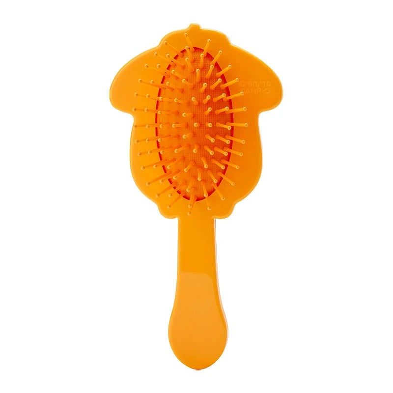 Portable character hair brush in a bathroom setting