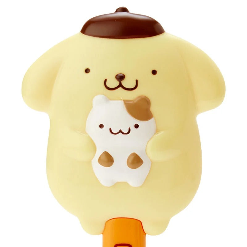 Cute Pompompurin die-cut hair brush stored in a cup container