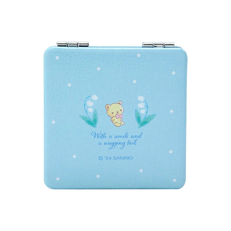 Cinnamoroll makeup mirror being held, demonstrating its portability