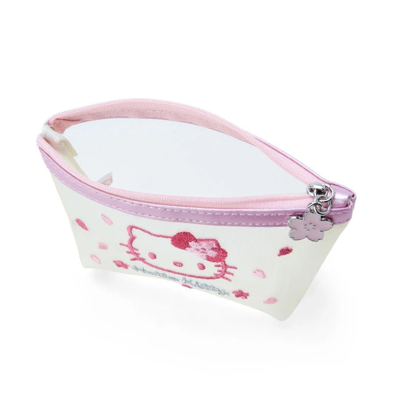 Open pink Sakura Series pouch showing organized makeup inside