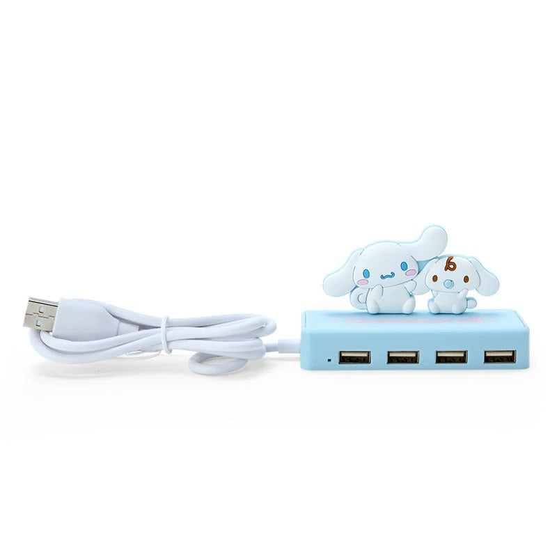 Close-up of the USB ports on the Cinnamoroll mini USB hub, showing its cute design
