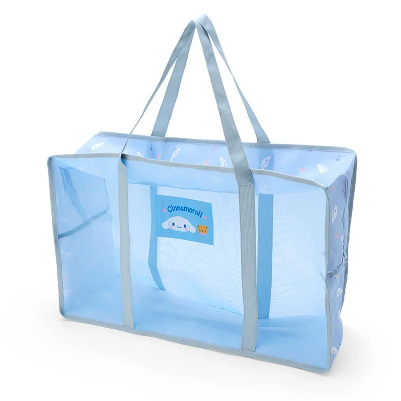Large Sanrio mesh tote bag folded flat beside measuring tape for size reference