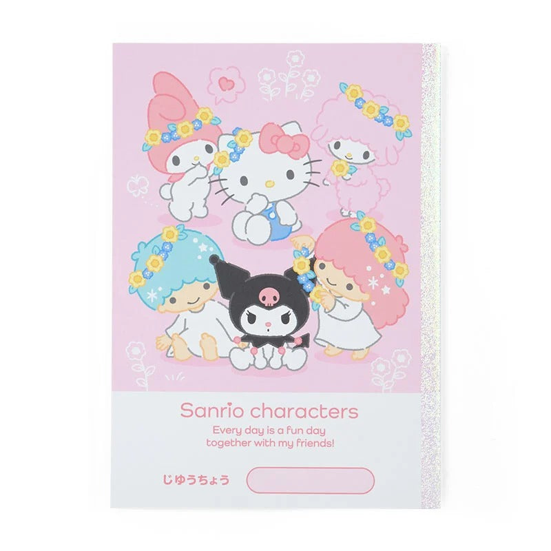 Close-up of the pink Sanrio journal showing lined pages and characters.