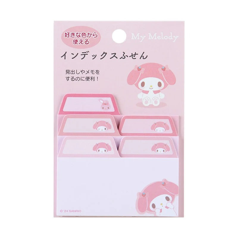 Angle view of My Melody sticky notes fanned out beside a study planner