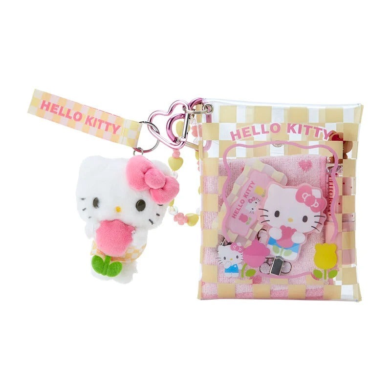 Clear snap pouch clipped onto a tote for easy access