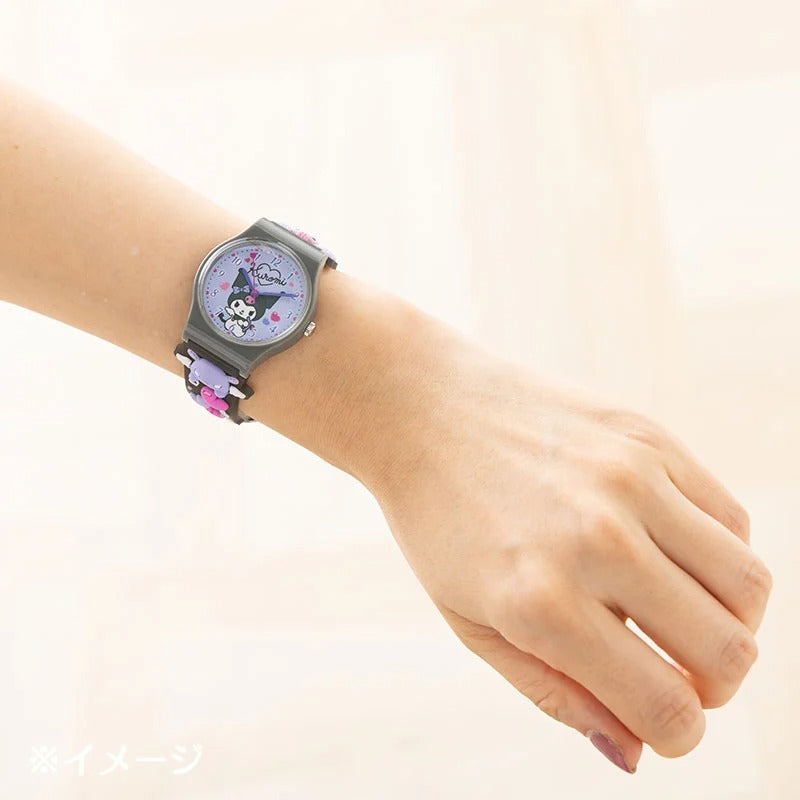 Side angle showing the flexible jelly strap with Sanrio character motifs