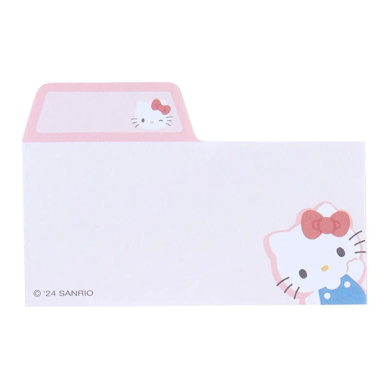 A student using Hello Kitty sticky notes while studying for an exam.