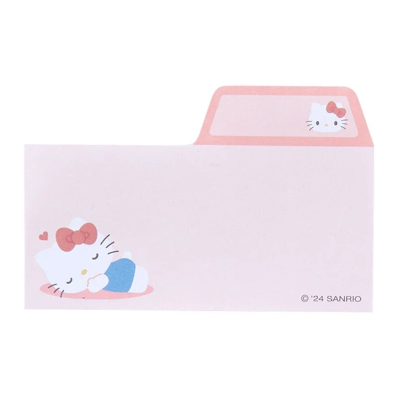 Close-up of Hello Kitty index tab sticky notes in various designs.