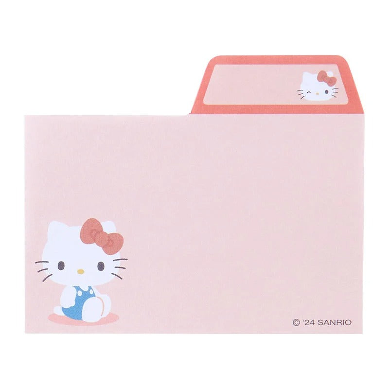 A student using Hello Kitty sticky notes while studying for an exam.
