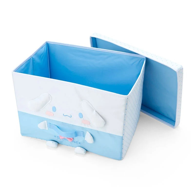 Foldable cloth storage box with lid shown stacked with other Sanrio storage boxes