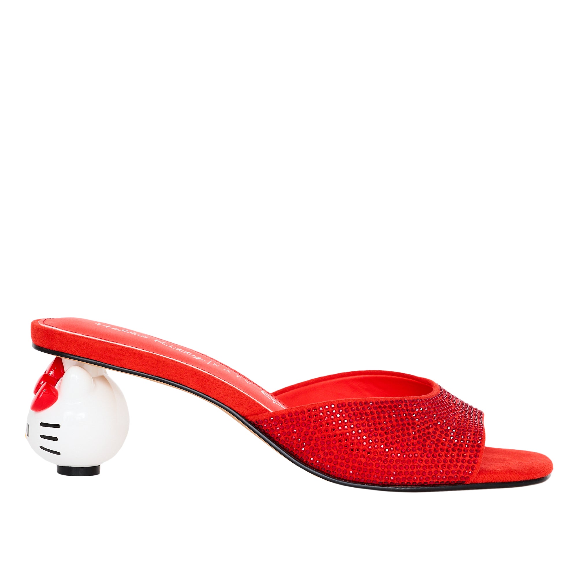 Red Hello Kitty mule styled with summer outfit for NYC streetwear