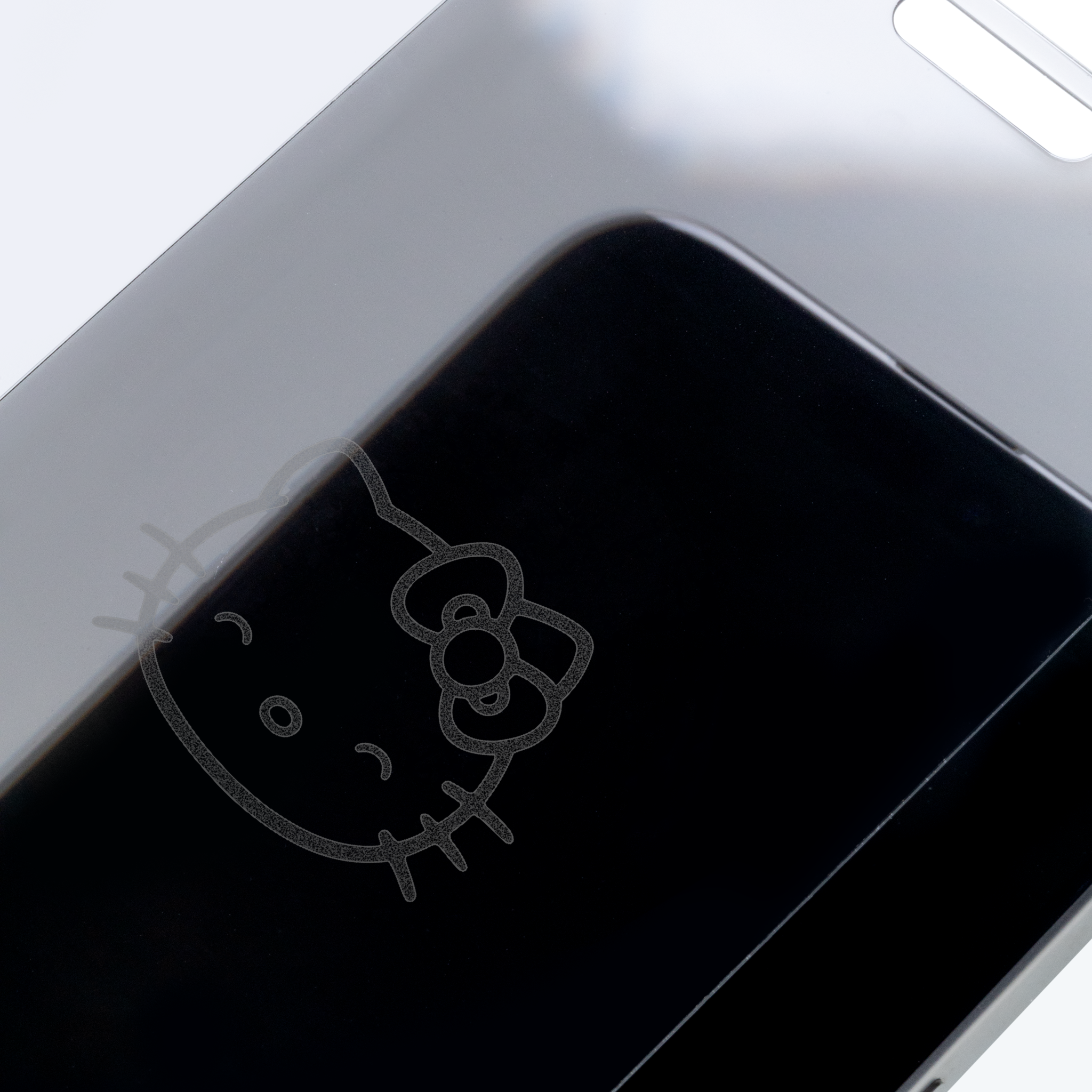 Installation process of tempered glass screen protector on iPhone