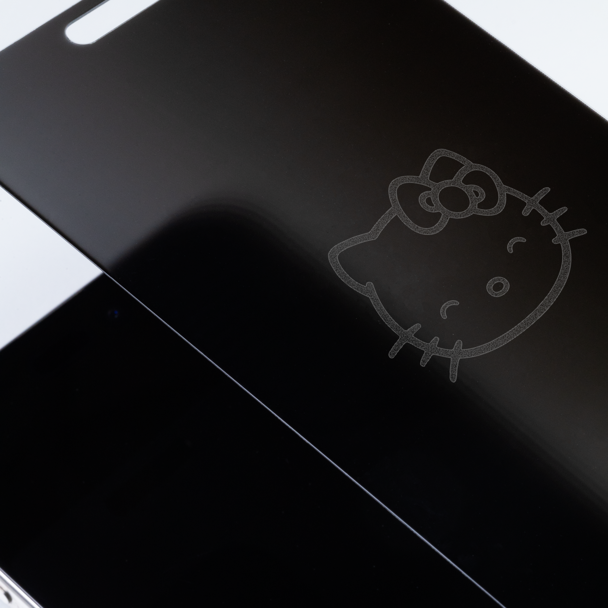 Close-up of Hello Kitty design on tempered glass protector