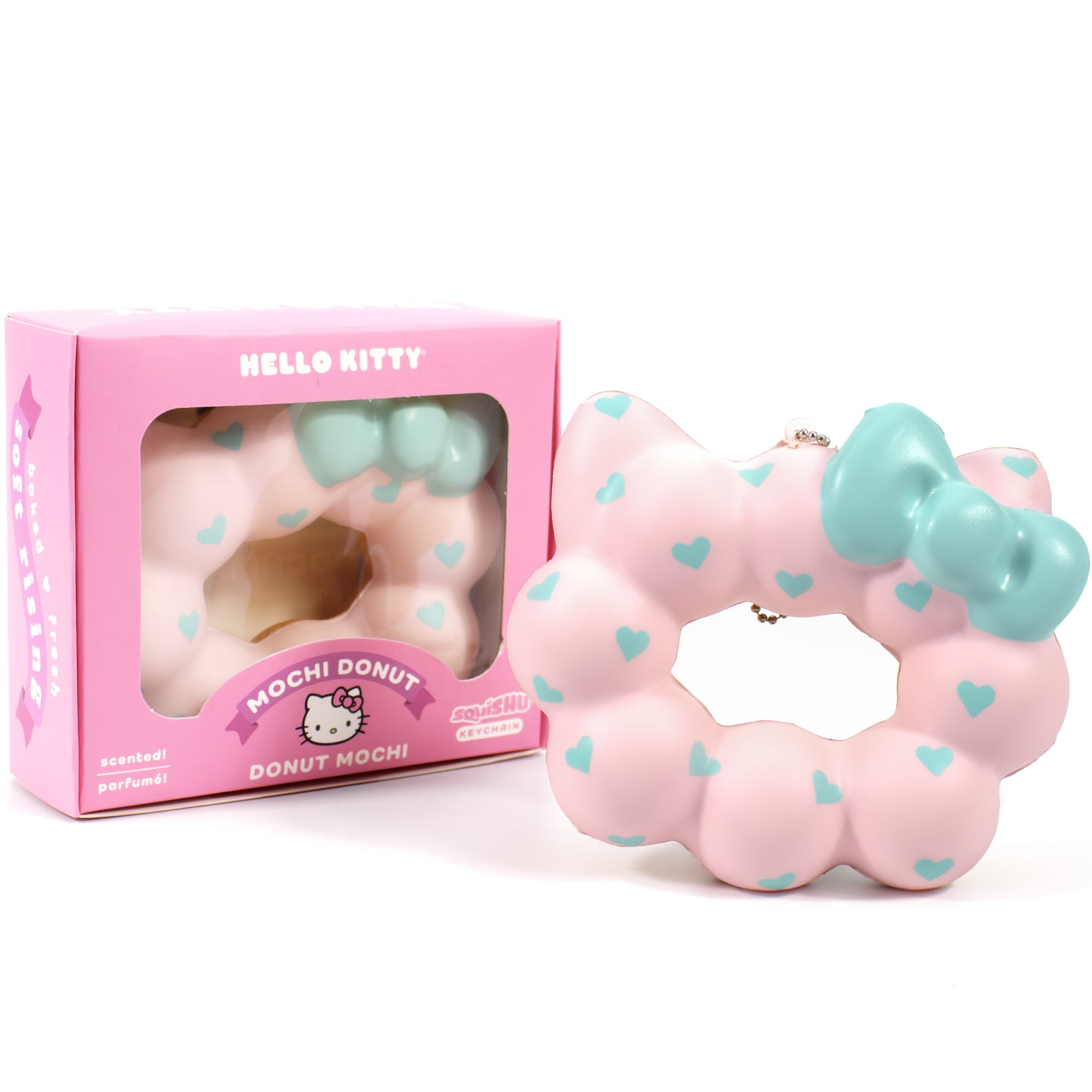 Close-up of Hello Kitty mochi donut squishy keychain, highlighting its detailed design.