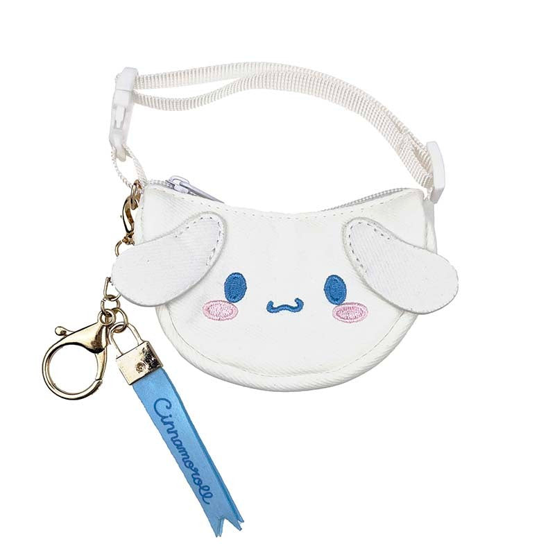 Cinnamoroll mini charm attached to a denim backpack strap