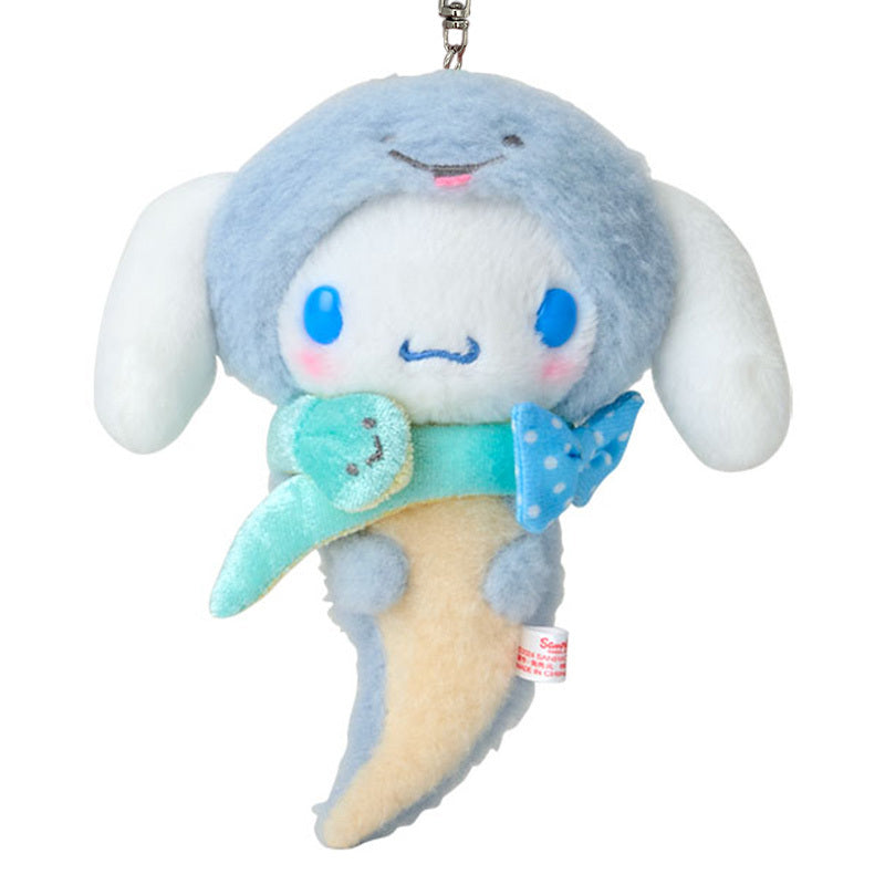 Close-up showing embroidery details on Cinnamoroll’s face and serpent costume.
