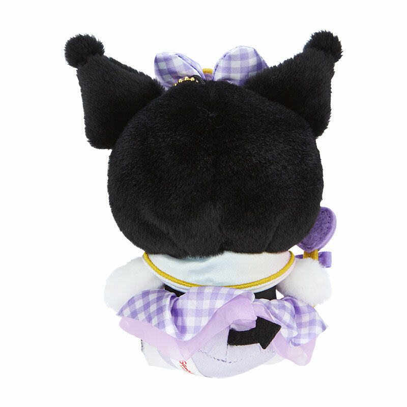 Angle view of Kuromi keychain wand and outfit, highlighting Sanrio character design