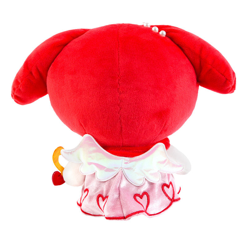 My Melody plush displayed on a shelf with colorful plushies, highlighting the vivid colors and dual personalities