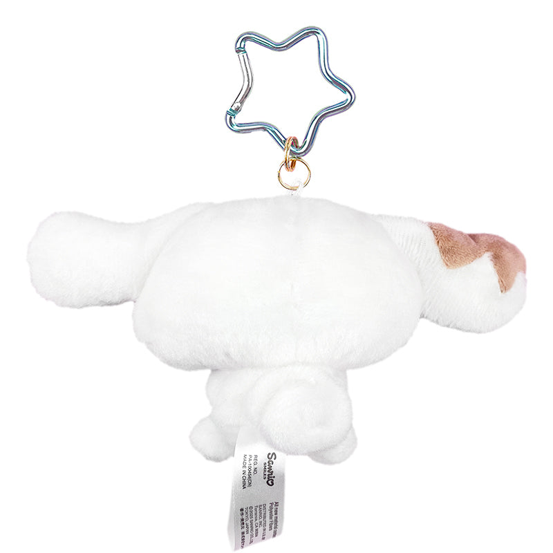 Side angle of the large cinnamoroll plush toy clipped onto a pastel backpack, ideal for outdoor adventures.