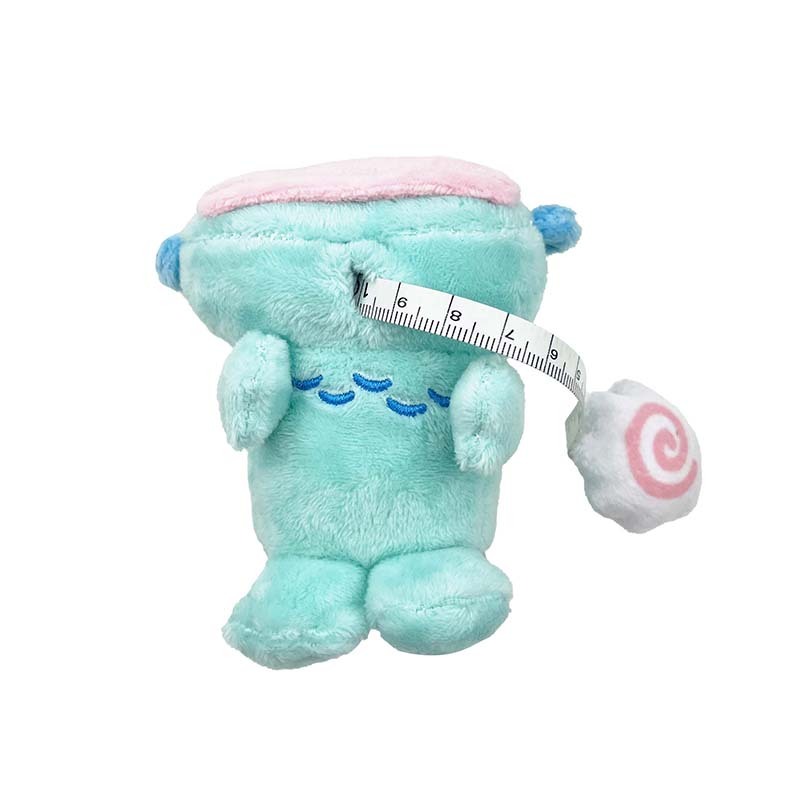 Sanrio-themed measuring tape held in hand, showing the embroidered details.