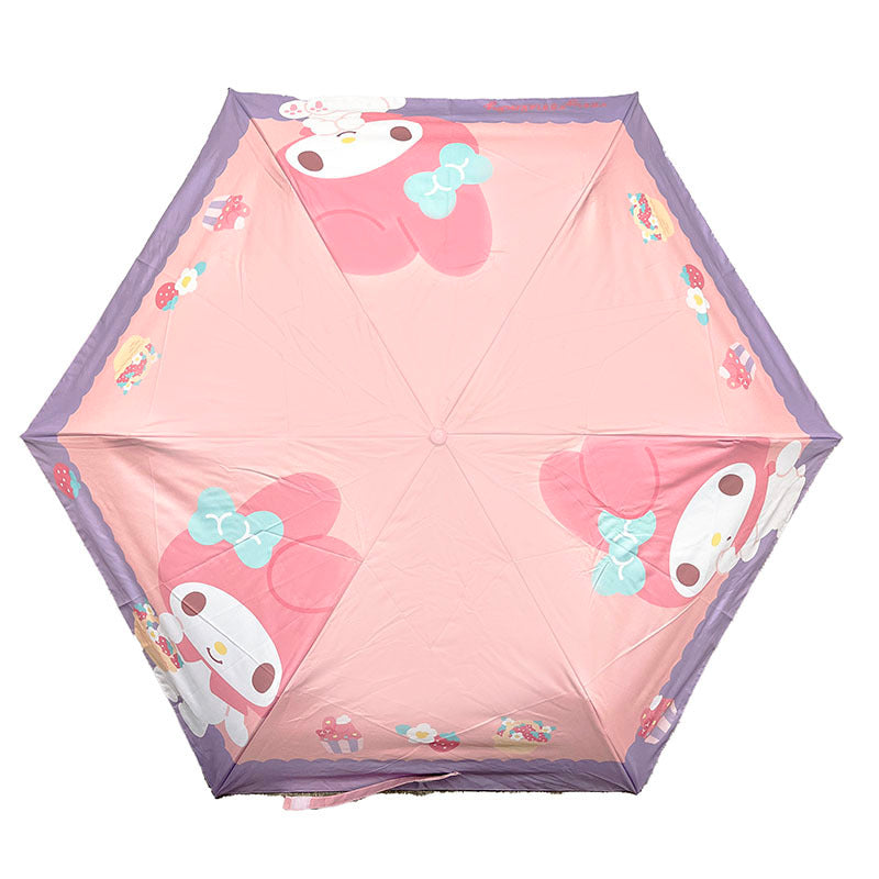 My Melody umbrella folded with carrying sleeve for easy travel.